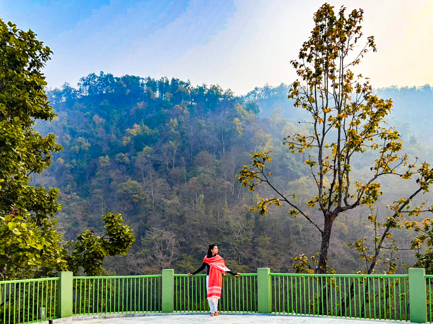 Tara at a jungle ashram in Rishikesh, India, surrounded by the Himalayan foothills